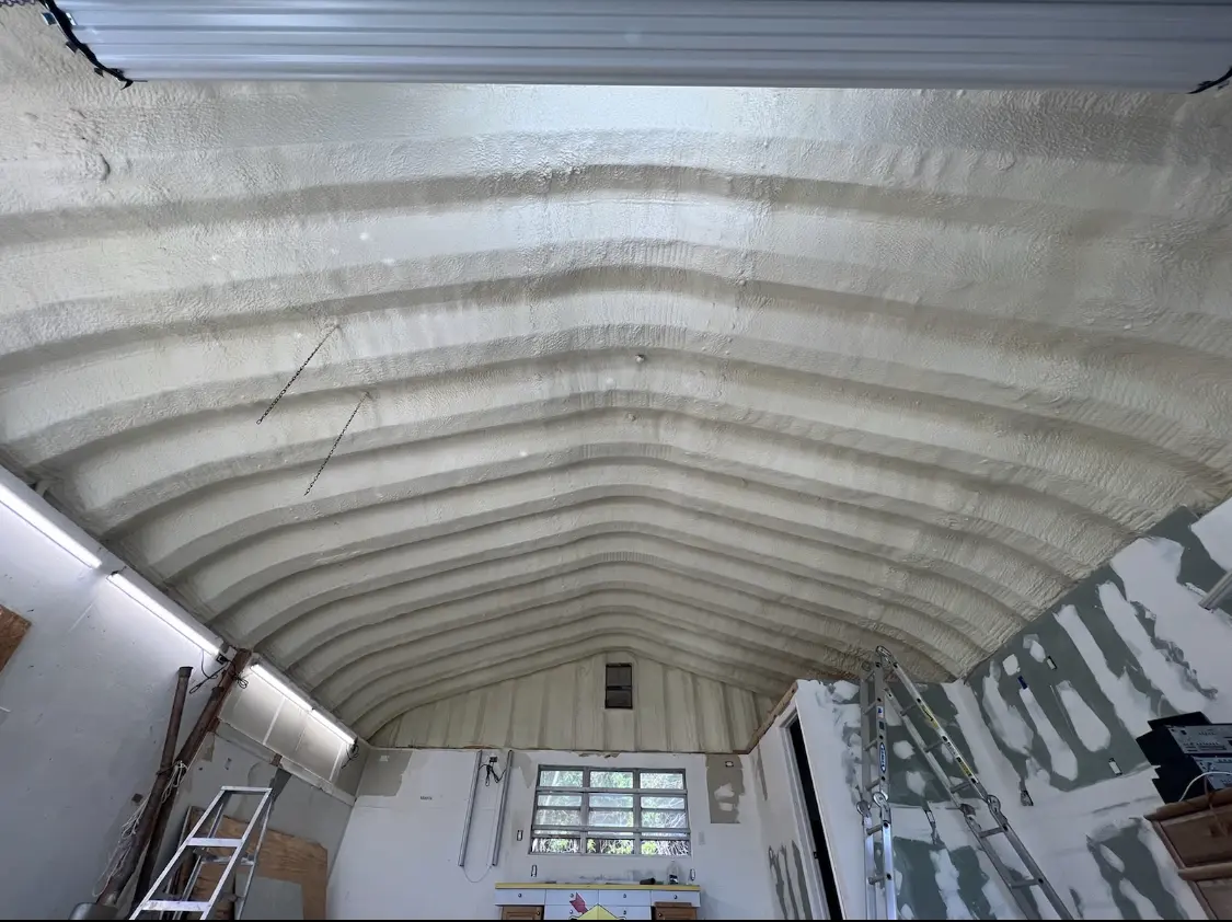 Spray polyurethane foam applied to the underside of a metal roof deck in Margate